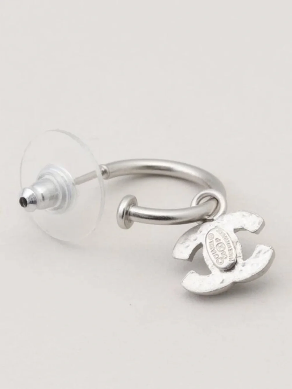 CHANEL Pierced Silver Hoop Earrings with Black CC Charm